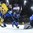 COLOGNE, GERMANY - MAY 20: Sweden's Oscar Lindberg #15 and Finland's Topi Jaakola #6 battle for position while Finland's Harri Sateri #29 makes a save during semifinal round action at the 2017 IIHF Ice Hockey World Championship. (Photo by Matt Zambonin/HHOF-IIHF Images)

